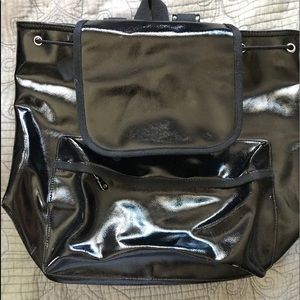 Shiny black Urban Outfitters backpack